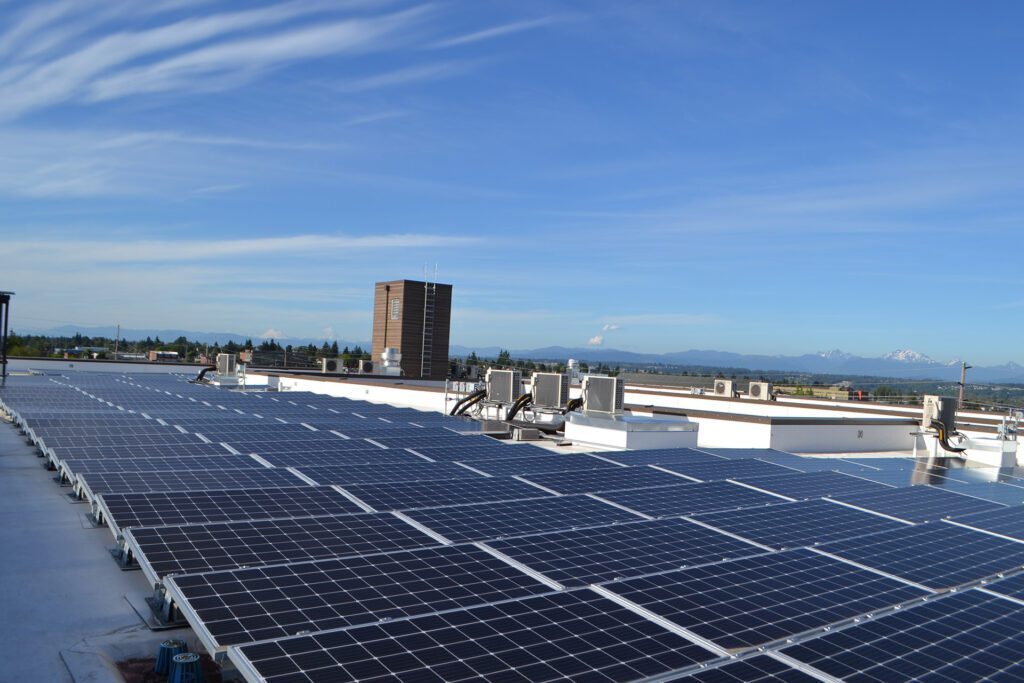 Photo of the roof of LEED Platinum HopeWorks Station North, showcasing the array of solar panels.
